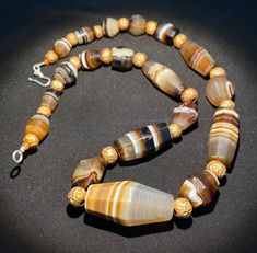 The Beautiful Rare Collection Of Faceted Cut Banded Agate Beads. Very Good Conditions.  Very Good Quality Of Agate.  Some Gold Plated Wax Beads Are Used As Spacers In The Necklace.     We Provide Fast And Free Shipping Service. Luxury Agate Gemstone Beaded Necklaces, Carnelian Beads, Banded Agate, Agate Beads, Gold Beads, Necklace Designs, Quartz Crystal, Antique Jewelry, Vintage Antiques