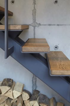 the stairs are made of wood and steel