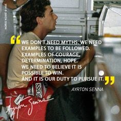 a man sitting in front of an oven with a quote on it