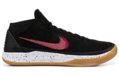 the nike basketball shoe is black and red