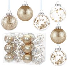 christmas ornaments in clear boxes with gold and silver baubles hanging from the top