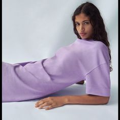 Crewneck Off The Shoulder Sleeve Very Soft & Comfortable Does Have Stretch Purple Loose Fit Dress For Spring, Purple Relaxed Fit Dress For Spring, Spring Loungewear Dress With Crew Neck, Casual Crew Neck Midi Dress For Daywear, Casual Lavender Cotton Mini Dress, Casual Lavender Knee-length Midi Dress, Relaxed Fit Crew Neck Dresses For Loungewear, Spring Knee-length T-shirt Dress For Loungewear, Purple Cotton Relaxed Fit Dress