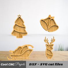 three wooden cutouts of santa's sleigh and reindeers with bells