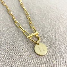 Heatherly Designs basic everyday layering necklace featuring a chunky popular paperclip chain. The necklace closes in the front with a unique toggle clasp in a square shape with a coin charm with your initial of choice. Made from jeweler's brass plated in 14k gold. ●Nickel free ●Padlock initial necklace is sold separately here: https://www.etsy.com/listing/877080160 ●Arrives in our signature Heatherly gift box. Handmade with ❤ by Heather ● ● ● ● ● ● ● ● ● ● ● ● ● ● ● ● ● ● ● ● ● ● ● ● ● ● ● ● →Q Personalized Link Chain Necklace For Everyday, Everyday Personalized Link Chain Necklace, Everyday Toggle Necklace With Oval Link Paperclip Chain, Minimalist Paperclip Chain Necklace With Toggle Clasp, Minimalist Toggle Necklace With Paperclip Chain, Everyday Toggle Necklace With Paperclip Chain, Everyday Minimalist Toggle Necklace With Rectangular Links, Everyday Paperclip Chain Necklace With Toggle Clasp, Minimalist Paperclip Toggle Necklace As Gift