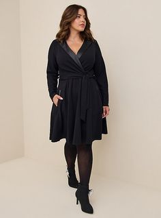 Let this sharp tuxedo dress prep you for those suit up moments. It features a satin lapel and a structured yet comfortable fabric you can make major moves in. V-neck. Notched lapels. Stretch waist. Removable self-tie sash. Long sleeves. Side Pockets. Skater silhouette. Unlined. CONTENT + CARESelf: nylon/rayon/spandex; contrast: polyester/spandex. Wash cold; line dry. Imported plus size dresses. SIZE + FITModel is 5'8”, size 1. Size 2 measures 41” from shoulder. The best plus size women's mini tu Work Formal, Red Leggings, Tuxedo Dress, Suit Up, Super Cute Dresses, Black Mini, Wearing Dress, Polyester Spandex, Size 20