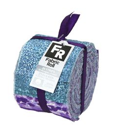 the fabric roll has purple and blue designs on it