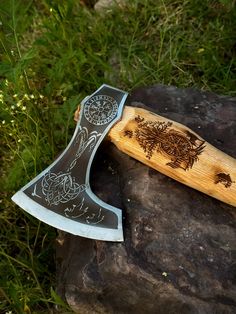 "Viking Axe, Groomsmen gifts, 3rd year Anniversary Gift, High Carbon Steel, Engraved Ash Wood Handle, Gift for Husband. This wood handle, viking axe is heavy-duty, and quality constructed for years of reliable use. Makes a great gift for Hunters, Father's day and Groomsmen Gifts. The personalized gift for him is excellent for use on the ranch, farm,camping or wherever a hand-held tool is extremely helpful. Axe Details: Total Length: 20\" Handle Length: 18\" Handle Material: Ash Wood Blade Dimensions: 6\" X 5.5\" Blade Material: High Carbon Steel Butt Dimensions: 1\" X 1.5\" Eye Dimensions: 1\" X 1.5\" Blade: Sharpened Pitch: 2\" Sheath Cover: Cow Leather Handle: engraved This is a perfect gift for your husband, husband-to-be, your father, brother, or anyone who loves axes.  - Package Inclu Farm Camping, 3rd Year Anniversary, 3rd Year Anniversary Gifts, Ragnar Lothbrok Vikings, Best Gift For Husband, Ranch Farm, Gift Husband, Gifts For Hunters, Groomsmen Gifts