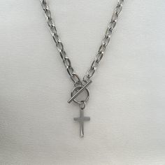 Elevate your streetwear game with our Cross Pendant Necklace. Perfect for both men and women, this unisex style adds a touch of edginess to any outfit. Embrace your individuality and make a statement with this must-have accessory. Necklace length 22.0 inch, Chain width 6 mm. Punk Cross Necklace For Streetwear, Punk Streetwear Cross Necklaces, Punk Cross Jewelry For Streetwear, Women Streetwear, Hip Hop Style, Necklace For Men, Cross Pendant Necklace, Style Streetwear, Streetwear Women