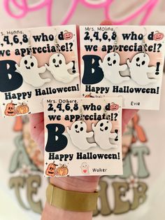 three halloween cards with ghost faces on them