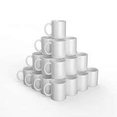 a stack of white coffee mugs sitting next to each other on top of one another