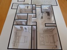 the floor plan for a house is shown in black and white, with drawings on it