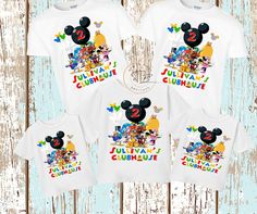 three mickey mouse shirts with the number two on them, including one for each child