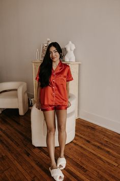 Experience the luxury feel of our satin blend pajamas infused with spandex for maximum flexibility and comfort. Perfect for lounging around or drifting off to sleep. Immerse yourself in our breathable and fluid sleepwear fabrics, the perfect retreat to whisk you away to dreamland. Featuring delicate design details like pearlized shell shirt buttons, cuff hems, and contrast piping trim. Add a sentimental touch with our printed personalization option, making these pajamas the perfect gift for a loved one or keepsake for your own sleepwear collection. Purchase includes the top & bottoms set. See photos for size guide. Colors may slightly vary due to screen settings.  Care: Machine wash in warm water on a *delicate* cycle with low agitation. Tumble dry low or hang to dry. Do not dry clean. Ple Orange Pajamas, Bride Pajamas, Wedding Pajamas, Pajamas Satin, Pajamas Silk, Silk Pjs, Satin Pyjama, Red Pajamas, Pyjama Satin