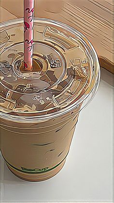 a plastic cup with a pink straw sticking out of it's top, sitting on a table