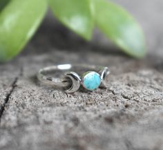 Turquoise Moon Ring Details:- .925 Solid Sterling Silver - Design 11mm x 6mm , 2mm width ring band- Natural 5mm turquoise- Two stack set options: Add Moon/Star Band, or Southwest/Aztec Band.- Available in US ring sizes 4-10.5 with half sizes.Connect with us on Instagram @a_wild_violet for sales and giveaways!**All items are in stock and ship within 2-5 business days from received payment (excluding Saturday/Sunday) from the US. If you are within the US please expect 3-7 business days for shippin Turquoise Moonstone Ring In Sterling Silver, Moon Jewelry Silver, Silver Moon Ring, Moon Phase Ring, Ring Moon, Moon Ring, Silver Design, Moon Jewelry, Silver Moon