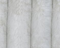 the white fur is lined up in rows