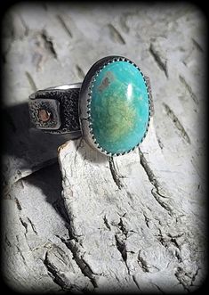 Beautiful natural Stone Mountain Turquoise (from Nevada) set in sterling silver. Reticulated sterling silver band with copper accent. Ring Size 10 Rustic Sterling Silver Turquoise Ring Gift, Rustic Silver Rings With Patina, Southwestern Turquoise Rings With Patina, Artisan Turquoise Chrysoprase Rings, Artisan Turquoise Ring With Patina, Handmade Turquoise Artisan Opal Ring, Handmade Artisan Turquoise Opal Ring, Handmade Turquoise Opal Ring Artisan Style, Sterling Silver Patina Ring