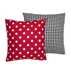 two red and black pillows with white polka dots