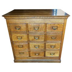 an old wooden dresser with many drawers