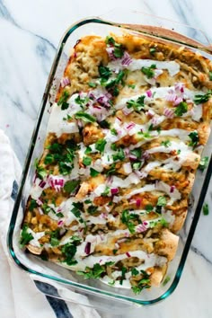 chicken enchilada casserole with sour cream sauce and cilantro