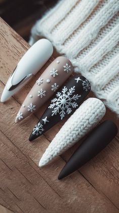 Embrace the beauty of winter with this stunning nail design! Featuring a combination of stiletto shapes, matte black accents, and delicate white snowflakes, these nails are perfect for the season. The textured white nail adds a cozy knitted effect, making this look both stylish and festive. Get inspired to recreate this elegant winter manicure for your next outing!
#nailsart #nailsart #nailsinspo #acrylicnails #nailsdesign #winternails #decembernails