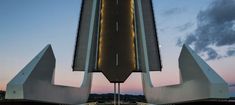 an image of a highway going through the center of a bridge at dusk or dawn