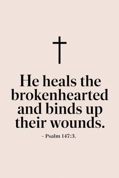 a cross with the words, he heals the brokenhearted and bends up their wounds