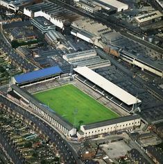 an aerial view of a soccer field in the city