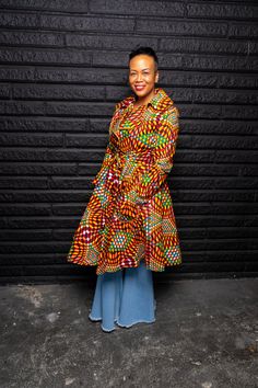 Beautiful Ankara Fabric. Exclusively Diary Of Queen Esther. Non-Strech. Fits true to size. Deep Pockets. Peplum style. Gold button details. Inner jacket lining. Exaggerated pop collar. Belt tie. Handwash and lay flat to dry. Size small fits size 4 -6. Medium 8-10 Large 10-12 XL 14 Models are wearing a size small. Mudcloth Clothing, Peplum Jacket Outfit, Ankara Jackets, Jacket Lining, Popped Collar, Queen Esther, Peplum Styling, Peplum Jacket, Belt Tie