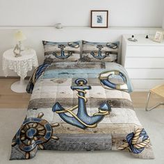 a bed with an anchor and steering wheel on it in a room next to a chair