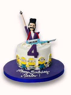 a birthday cake with an image of a man holding a knife and keyboard on it