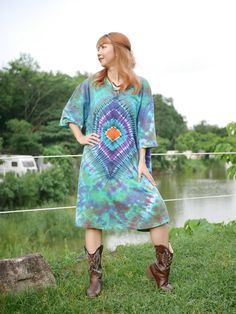 *This item is ready to ship in 2-3 weeks. Elevate your wardrobe with our stunning hand-dyed tie-dye dress, a perfect blend of vibrant hues and comfortable design. This dress showcases a vibrant, hand-dyed tie-dye dress featuring a striking combination of colors and patterns. Material and Fit: Made from 100% cotton, this tee dress/shirt dress is designed for ultimate comfort and breathability. The oversized fit is versatile and accommodating, fitting busts up to 54". With a length of 34", it can be worn as a dress or paired with leggings or jeans for a more casual look. Care Instructions: For ease of maintenance, the dress is machine washable and can be tumble dried. However, to preserve the vibrant colors and softness of the fabric, we recommend hand washing initially. Whether you're loung Shirt Kaftan, Tie Dye Clothing, Festival Shirt, Tie Dye Outfits, Beach Dresses Summer, Festival Shirts, Dye Dress, Oversized Tunic, Comfortable Design