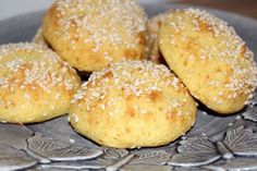 sesame seed rolls are on a plate and ready to be eaten