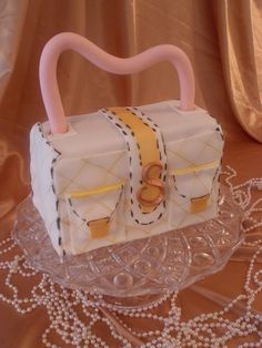 a cake that is shaped like a purse