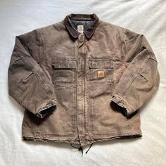 Vintage 90s Carhartt Made In Usa/Union-Made Brown Heavy Duty Quilt-Lined Winter Duck Jacket Tagged Size Xxl, Swipe For Measurements 8/10 Condition, Some Fading/Signs Of Wear, Small Tear On Back Right Side Rugged Long Sleeve Outerwear For Streetwear, Rugged Fall Outerwear For Streetwear, Rugged Outerwear For Fall Streetwear, Rugged Outerwear For Streetwear In Fall, Rugged Winter Streetwear Outerwear, Duck Jacket, Carhartt Jackets, How To Make Brown, Carhartt Mens Jacket