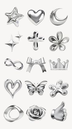 a bunch of silver objects that are in the shape of hearts, stars and other things