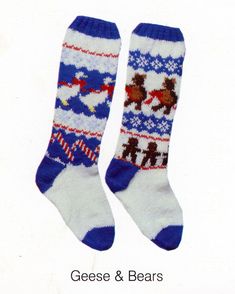 two socks with reindeers and snowflakes on them, one is blue and the other is white