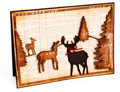 a card with deer and trees on it