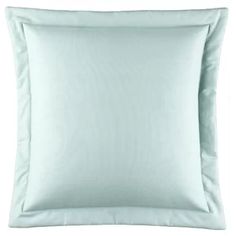 a light blue pillow on a white background