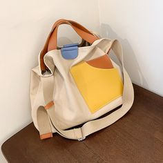 SPECIFICATIONSbolsa feminina: luxury designer handbagWomens Casual Totes: Stylish Crossbody Shoulder BagWeight: 0.38kgStyle: vintageSize: 37*31*10cmShoulder Strap: 104cmShape: Casual TotePractical Travelling Pouches: bags for womenPlace Of Origin: HE BEI ProvincePattern Type: panelledOrigin: CN(Origin)Occasion: VersatileModel Number: Women Tote BagMain Material: CanvasLining Material: CanvasInterior: Interior Slot PocketHardness: SoftGender: WOMENExterior: Open PocketColor: Black, white, khaki, Casual Tote Bag, Big Shoulders, نظارات شمسية, Travel Handbags, Cross Bag, Tote Bag Pattern, Work Bags, Casual Tote, Canvas Texture