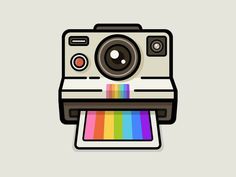 a polaroid camera sitting on top of a rainbow colored paper