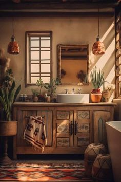 a bathroom with a sink, mirror and potted plants