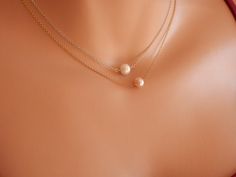 "Pink Pearl necklace Peach pearl necklace pink pearl choker peach Bridesmaid peach wedding flower girl necklace Bridesmaid Pearl Necklace Active Elegant and dainty sterling silver chain or gold vermeil ( gold plated over .925 sterling silver ) with a non floating - silver dark grey violet/white/pink/black, nearly round freshwater pearl! Pearls when get in contact with the skin, get the boby's temperature and that's why you feel peaceful... The perfect necklace for all occasions! Great gift for a Delicate Pink Pearl Necklace For Wedding, Dainty Pink Pearl Necklace For Gift, Delicate Pink Pearl Necklace With Pearl Chain, Classic Pink Pearl Drop Necklace, Feminine Pink Pearl Necklace, Pearl Necklace Pink, Bridesmaid Pearl Necklace, Peach Bridesmaid, Flower Girl Necklace