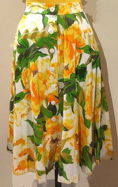 A vintage 70s tailored skirt. Produced with Falconetto cotton fabric with yellow, orange and green flowers on a white base. Measurements: waist cm 38, length cm 78. Size S. Very good condition. Sterilized and washed. Retro Floral Print Summer Skirt, Retro Floral Print Skirt For Summer, Vintage Yellow Lined Skirt, Vintage Yellow Cotton Skirt, Vintage White Floral Print Skirt, Vintage Green Skirt For Spring, Vintage Green Summer Skirt, Vintage Green Skirt For Summer, Retro Floral Print Cotton Skirt