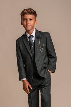 Boys Check Slim Fit Olive Green Wedding Pageboy Formal 3 Piece Suit Set Get your matching father and son suit in Men's sizes through the link: https://www.etsy.com/uk/listing/1269550982  SIRRI olive green check suit for boys by Cavani is a sleek and stylish three-piece ensemble that will look great at the next wedding, party or special occasion. This stunning slim-fit suit features an all-over checkered pattern perfect to match with a pastel colour tie and fitted shirt for an effortlessly classic style statement look. The rich colour makes eyes pop while complimenting nicely any skin tone. Create a less dressy outfit with this timeless, classic suit by wearing the blazer, waistcoat or trousers separately to attend church services or school events in a stylish, comfortable look. This boy's Olive Green Wedding, Suit For Boys, Suit Carrier, Olive Green Weddings, Check Suit, Green Suit, Tweed Suits, Three Piece Suit