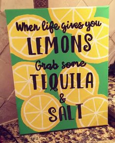 a sign that says when life gives you lemons grab some tequila and salt on it