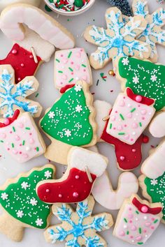 decorated christmas cookies on a white table