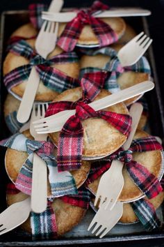 some pies with forks and bows on them