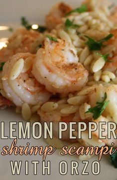 lemon pepper shrimp scamper with orzo on a white plate, garnished with parsley