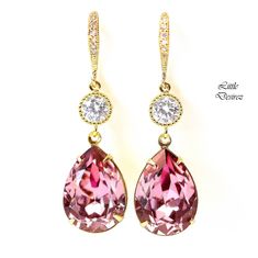 "Romantic and elegant Swarovski Gold Earrings in Vintage Rose! Antique Pink Crystal offers nostalgic appeal in a blush pink hue with the purple nuances of amethyst. The versatile crystal effect emits classic romance with its elegant and timeless, yet modern, appeal. Earrings made with: - the gorgeous and genuine 18x13mm Swarovski Antique Pink teardrop pear shaped fancy stones, set in gold plated settings - Hypoallergenic and tarnish resistant 16k gold plated rhinestone ear hooks - 16k gold plate Classic Pink Drop Jewelry, Classic Pink Earrings For Wedding, Classic Pink Jewelry For Wedding, Classic Pink Wedding Jewelry, Elegant Pink Teardrop Earrings As Gift, Elegant Pink Teardrop Earrings, Elegant Pink Teardrop Earrings For Party, Elegant Pink Teardrop Earrings For Gift, Classic Pink Earrings For Anniversary